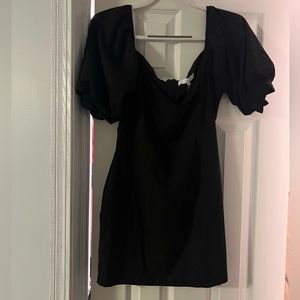 Form-fitting black mini dress